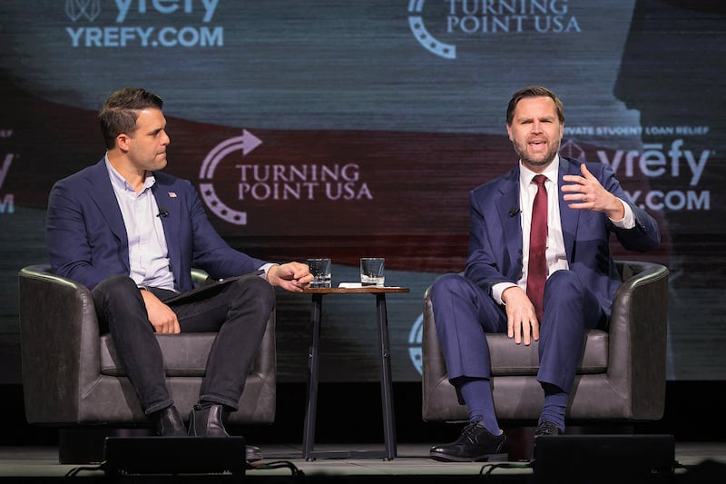 U.S. Vice President JD Vance speaks with Turning Point USA spokesperson Andrew Kolvet during a Turning Point USA event at Akins Ford Arena at the Classic Center on April 14, 2026, in Athens, Georgia, U.S.