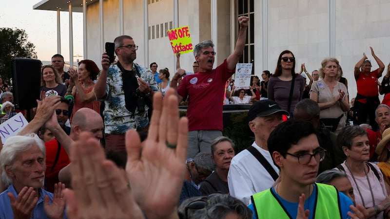 Protesters gather to denounce the Kennedy Center board's vote to close one of the nation's premier performing arts venues.