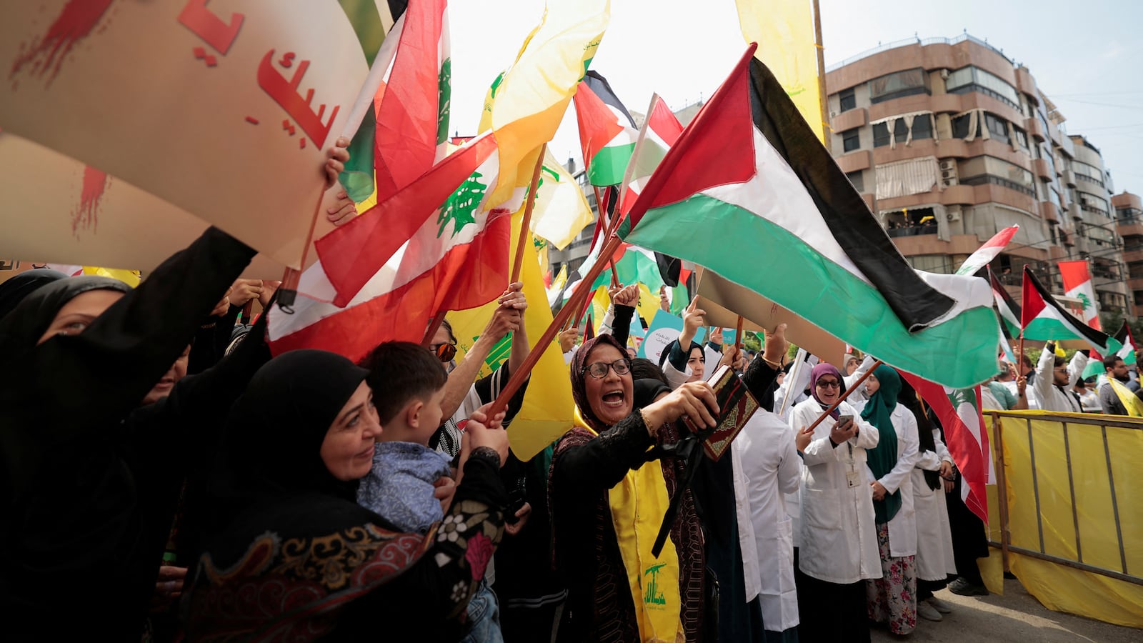 Hezbollah supporters attend a Beirut rally supporting Palestinians in Gaza.