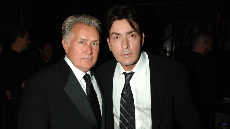 Martin Sheen and Charlie Sheen, presenters during 58th Annual Primetime Emmy Awards - Backstage at The Shrine Auditorium in Los Angeles, California, United States.