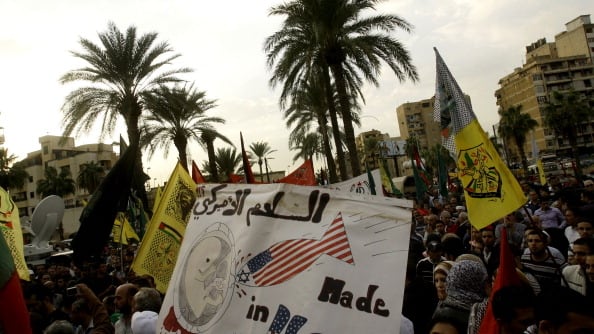 articles/2012/11/20/unite-don-t-divide-the-palestinians/hamasfatah_yeq9we