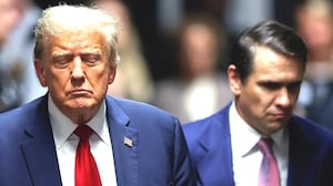 Former U.S. President Donald Trump closes his eyes as he leaves court during his trial for allegedly covering up hush money payments