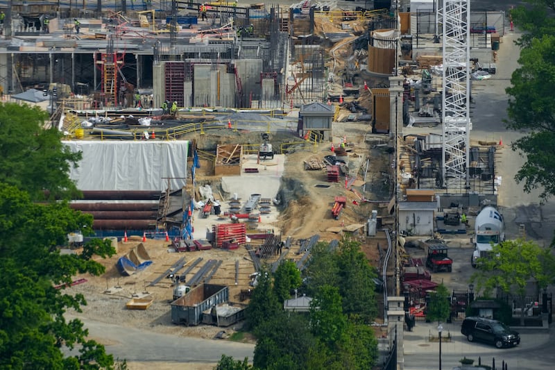 Aerial view from the top of the Washington Monument shows construction crews as they continue site preparation for a planned White House ballroom in the area of the former East Wing in Washington, D.C., U.S., May 2, 2026.