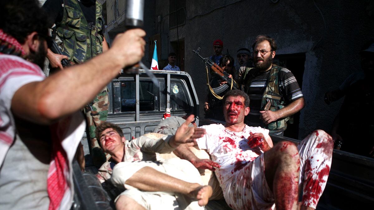 articles/2012/08/15/despite-pledge-syrian-rebels-continue-to-torture/dettmer-detention-center-syria_kfwgut