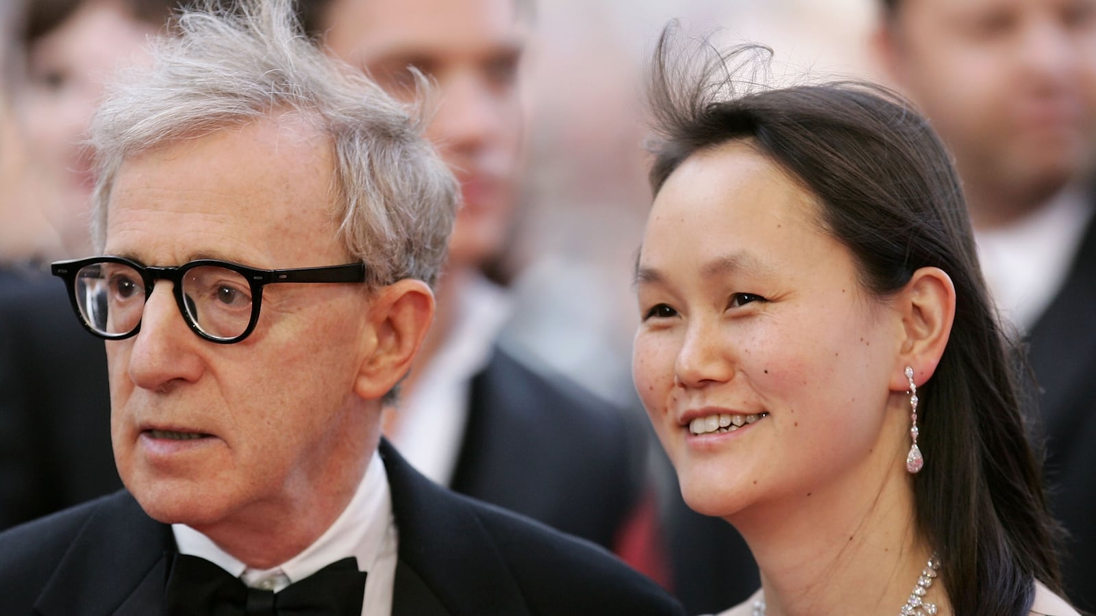 Director Woody Allen and his wife Soon-Yi Previn attend the premiere of the film "Match Point" at the Palais during the 58th International Cannes Film Festival May 12, 2005 in Cannes, France.