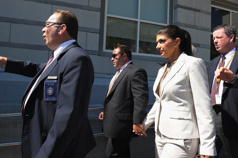 galleries/2013/07/30/teresa-guidice-taylor-armstrong-more-housewives-with-legal-woes-photos/housewives1_ee6swq