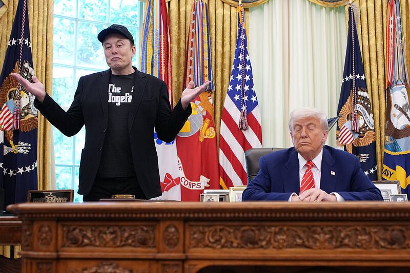 Tesla CEO Elon Musk speaks alongside U.S. President Donald Trump to reporters in the Oval Office of the White House on May 30, 2025 in Washington, DC. Musk, who served as an adviser to Trump and led the Department of Government Efficiency, announced he would leave his role in the Trump administration to refocus on his businesses. (Photo by Kevin Dietsch/Getty Images)