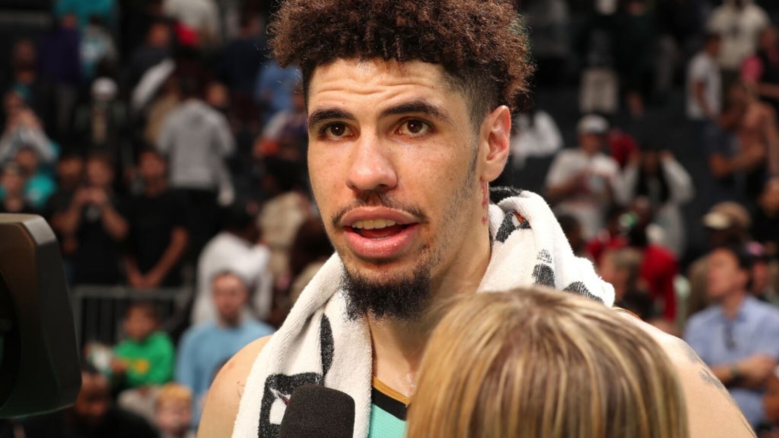 LaMelo Ball of the Charlotte Hornets talks to the media after a game against the Milwaukee Bucks.