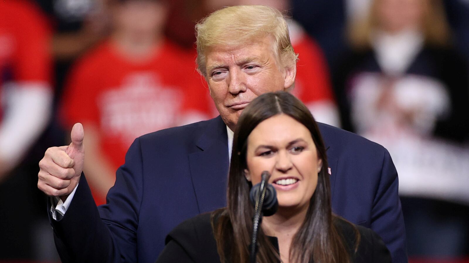 Former White House Press Secretary Sarah Huckabee Sanders joins U.S. President Donald Trump as he rallies with supporters in Des Moines, Iowa.
