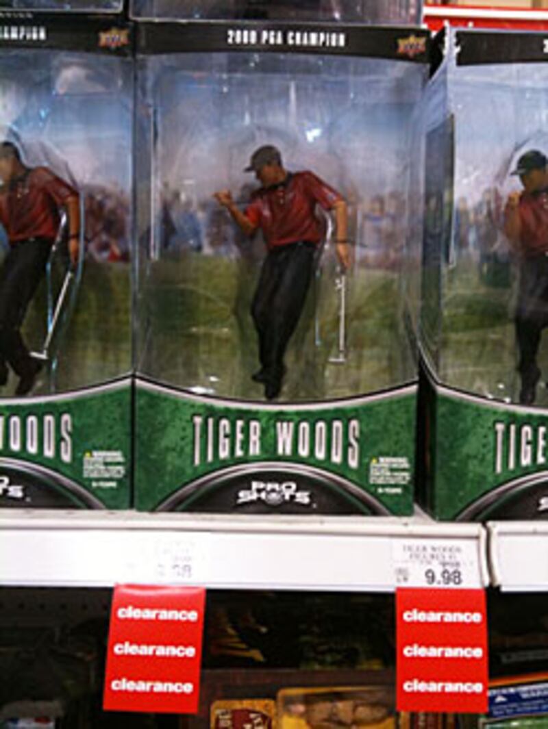 articles/2009/12/08/tiger-woods-fire-sale/mcdonald-tiger-woods-action-figure_67897_sukhj2