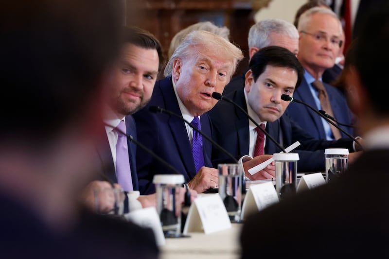 WASHINGTON, DC - JANUARY 09: U.S. President Donald Trump (C) looks on during a meeting with oil and gas executives in the East Room of the White House on January 9, 2026 in Washington, DC. Trump is holding the meeting to discuss plans for investment in Venezuela after ousting its leader Nicolás Maduro. (Photo by Chip Somodevilla/Getty Images)