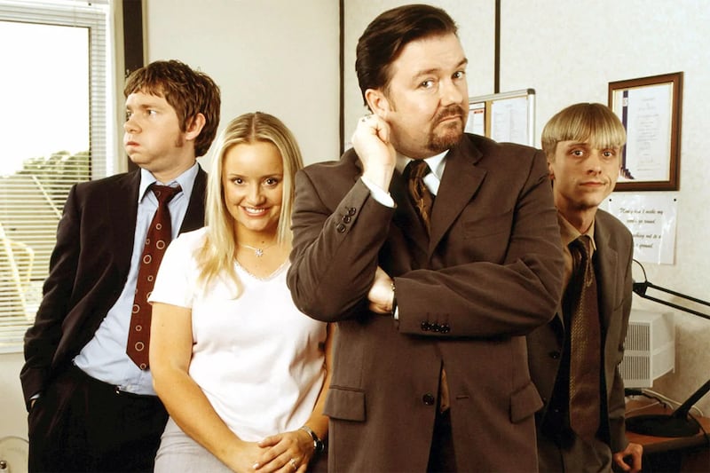 Mackenzie Crook, Lucy Davis, Martin Freeman, and Ricky Gervais in The Office.