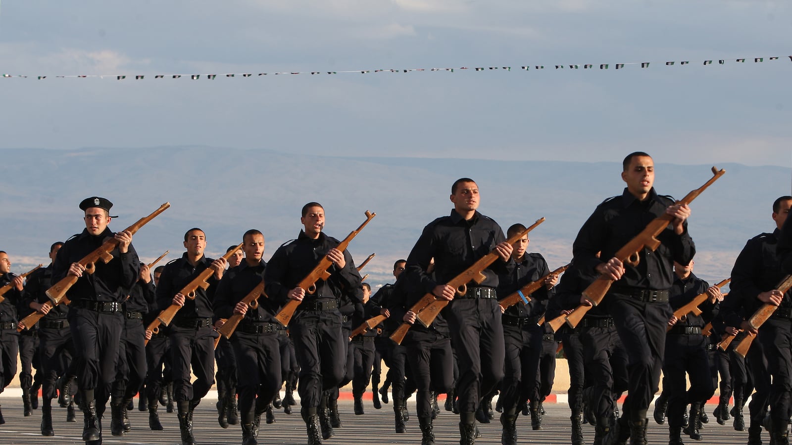 articles/2012/03/23/you-don-t-make-peace-with-your-friends/police-palestinian-zsquare_w6zmht