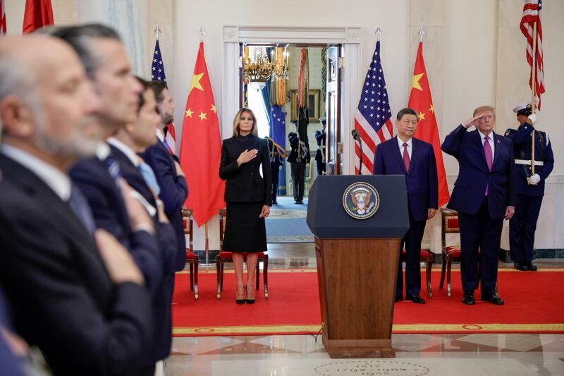 President Donald Trump, first lady Melania Trump and Chinese President Xi Jinping listen to national anthems before delivering remarks at the White House in Washington, D.C., US, September 24, 2026.
