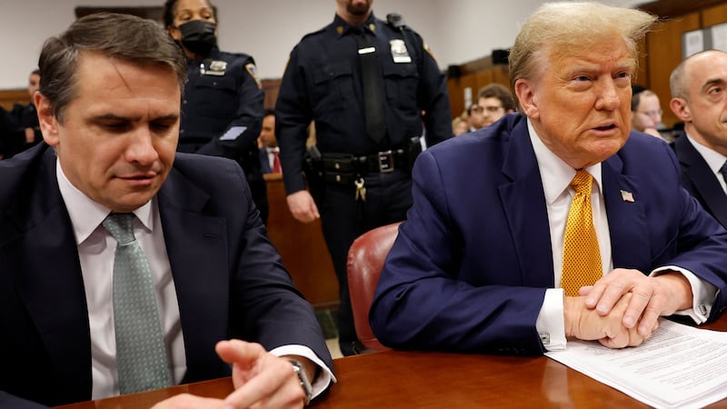 Former U.S. President Donald Trump sits in the courtroom with attorneys Todd Blanche and Emil Bove at Manhattan Criminal Court on May 14, 2024, in New York City, U.S.