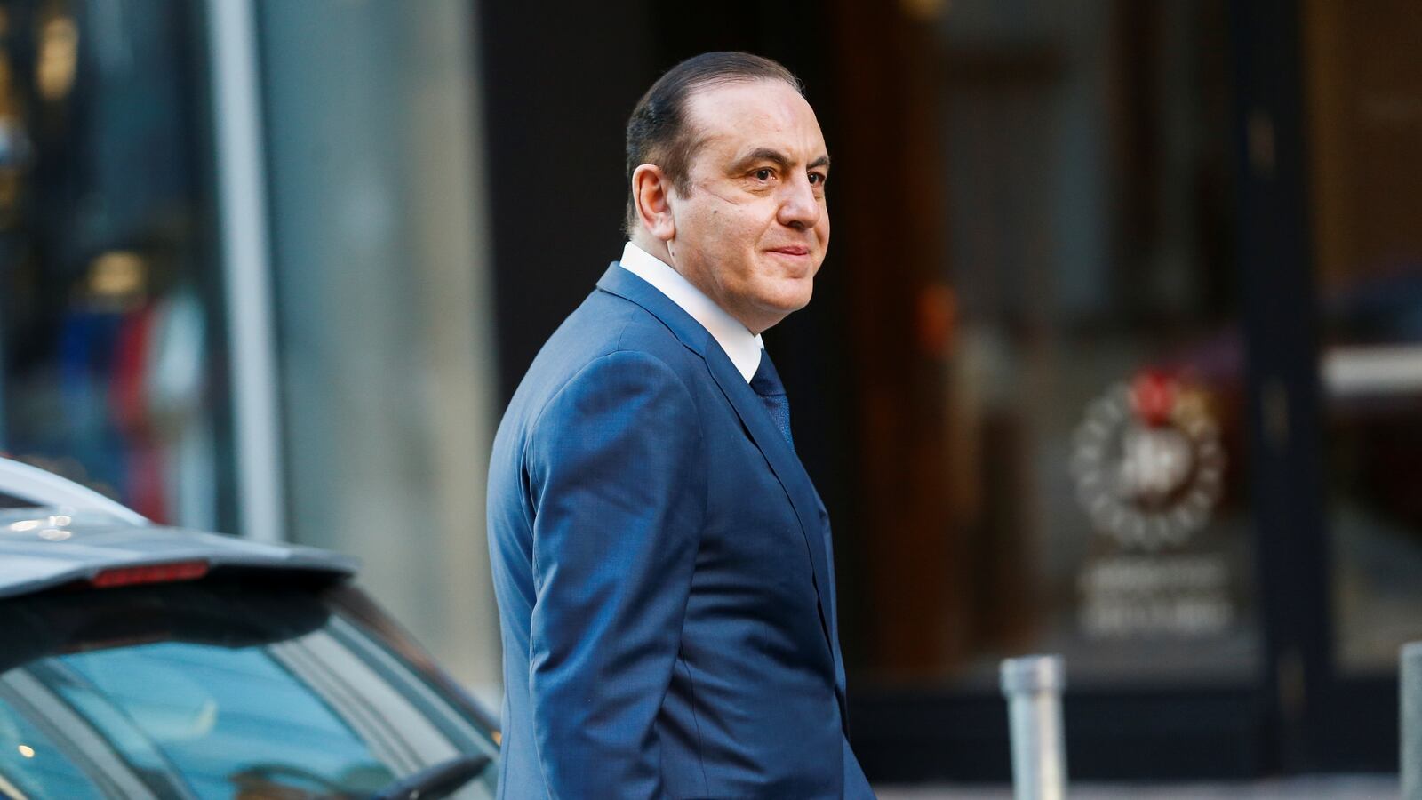 Gamal Abdelaziz, also known as Gamal Aziz, leaves the federal courthouse after being sentenced in connection with a nationwide college admissions cheating scheme in Boston, Massachusetts, Feb. 9, 2022.