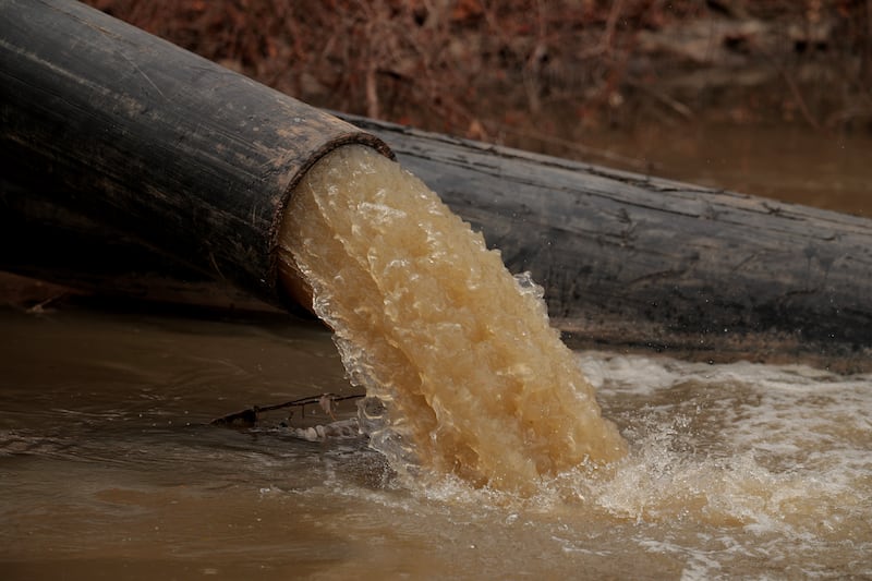 CABIN JOHN, MARYLAND - FEBRUARY 16: Pumps and pipes divert raw sewage into the C&O Canal and around a broken section of the Potomac Interceptor, a six-foot-wide pipe that collapsed on January 19, in between the Clara Barton Parkway and the canal on February 16, 2026 in Cabin John, Maryland. More than 300 million gallons of raw sewage poured into the Potomac River after the underground pipeline collapsed on January 19. According to the Potomac Riverkeeper Network and researchers at the University of Maryland, fecal-related bacteria and disease-causing pathogens in the Potomac River reached levels more than 2,700 times the safe limit.  (Photo by Chip Somodevilla/Getty Images)