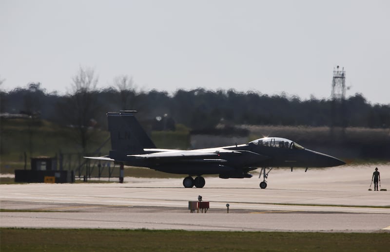 LAKENHEATH, UNITED KINGDOM - 2026/03/18: An F-15 seen preparing for take off at Lakenheath. RAF Lakenheath has been used for transiting planes on their way to war. Over 100 fighter jets have left RAF Lakenheath for the Middle East since January, according to Lakenheath Alliance for Peace. At least one F-15 jet from Lakenheath was reportedly among those that crashed in Kuwait at the beginning of the war. The major US air base in Suffolk hosts the United States Air Force Europe 48th Fighter Wing (Liberty Wing). (Photo by Martin Pope/SOPA Images/LightRocket via Getty Images)