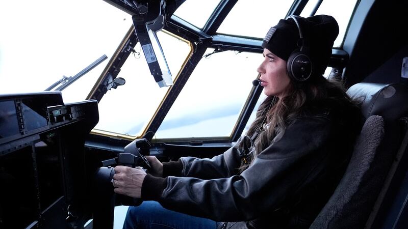 U.S. Homeland Security Secretary Kristi Noem flies an HC-130J aircraft during an aerial tour from U.S. Coast Guard Air Station Kodiak, Monday, March 17, 2025, in Kodiak, Alaska, U.S.     Alex Brandon/Pool via REUTERS