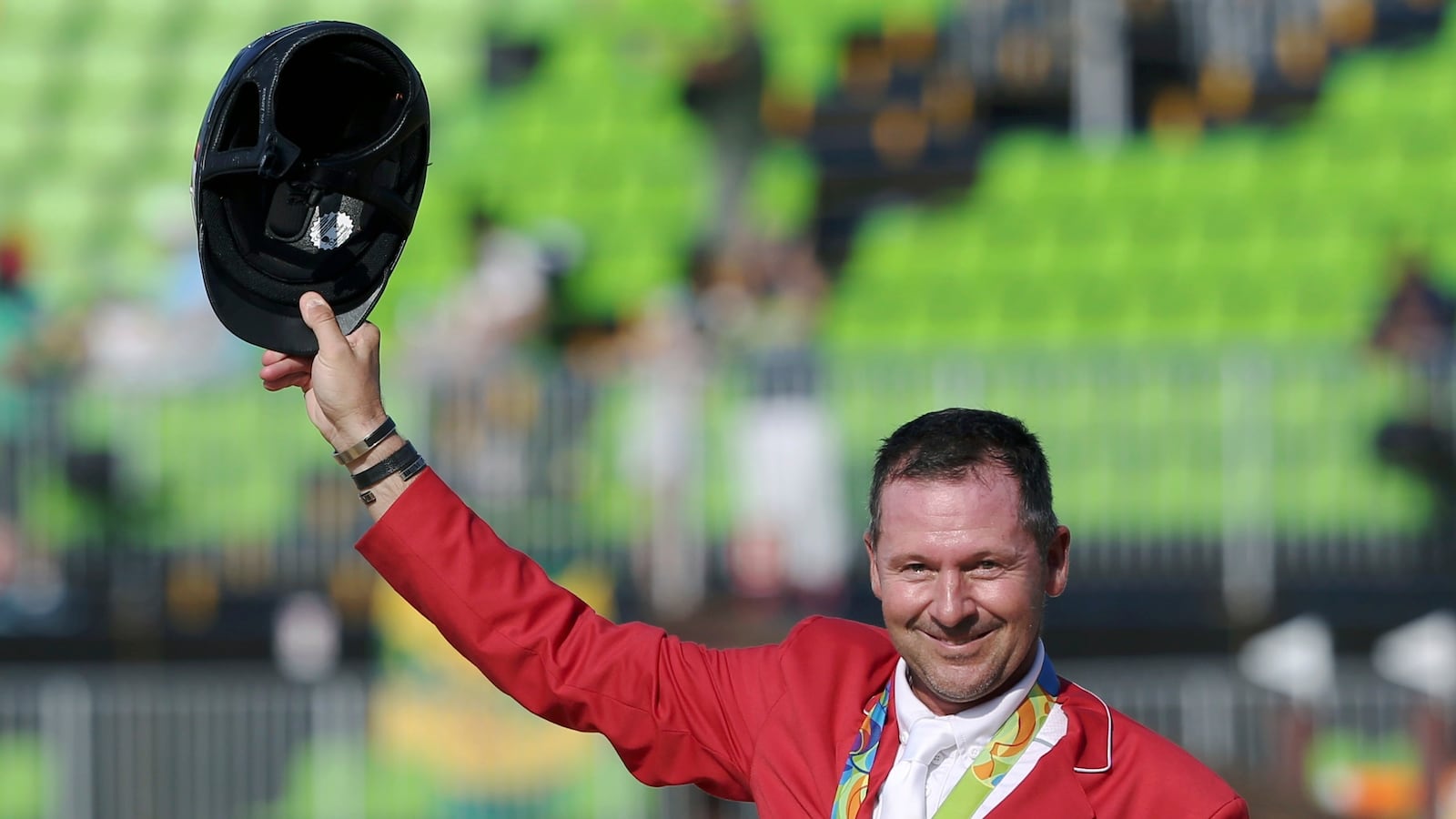 Eric Lamaze (CAN) of Canada celebrates his bronze medal in 2016