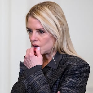 Attorney General Pam Bondi (R) speaks with the Deputy Attorney General Todd Blanche following a ceremony with President Donald Trump and the Florida Panthers of the National Hockey League, winners of the 2025 Stanley Cup, in the East Room of the White House in Washington, DC on January 15, 2026.