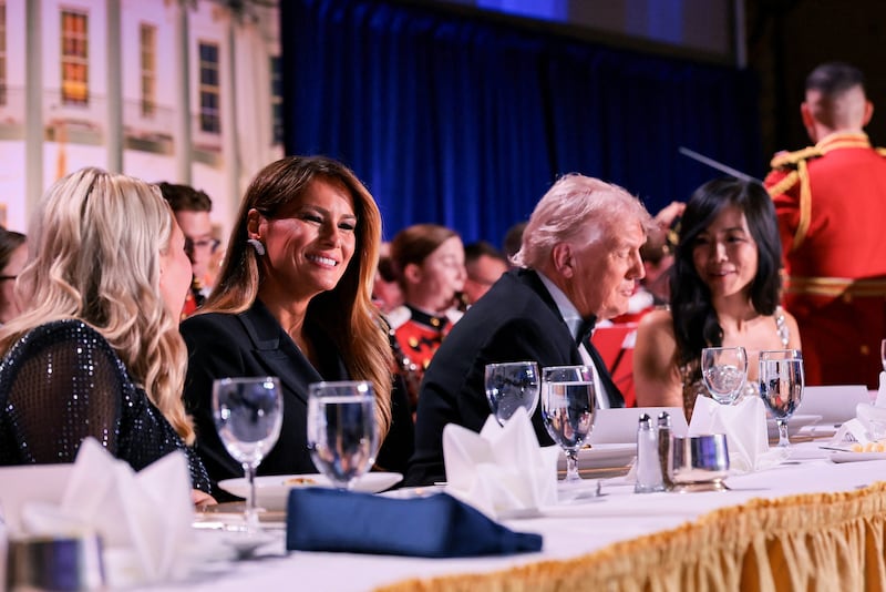 U.S. President Donald Trump, first lady Melania Trump, White House Press Secretary Karoline Leavitt and CBS News senior White House correspondent Weijia Jiang attend the annual White House Correspondents' Association dinner in Washington, D.C., U.S., April 25, 2026.