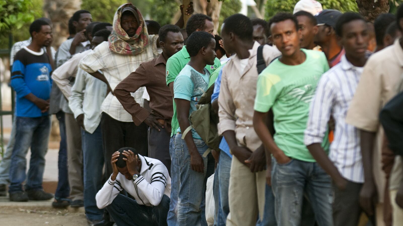 articles/2012/06/12/the-case-for-deportation/migrants-line-openz_iqaskc