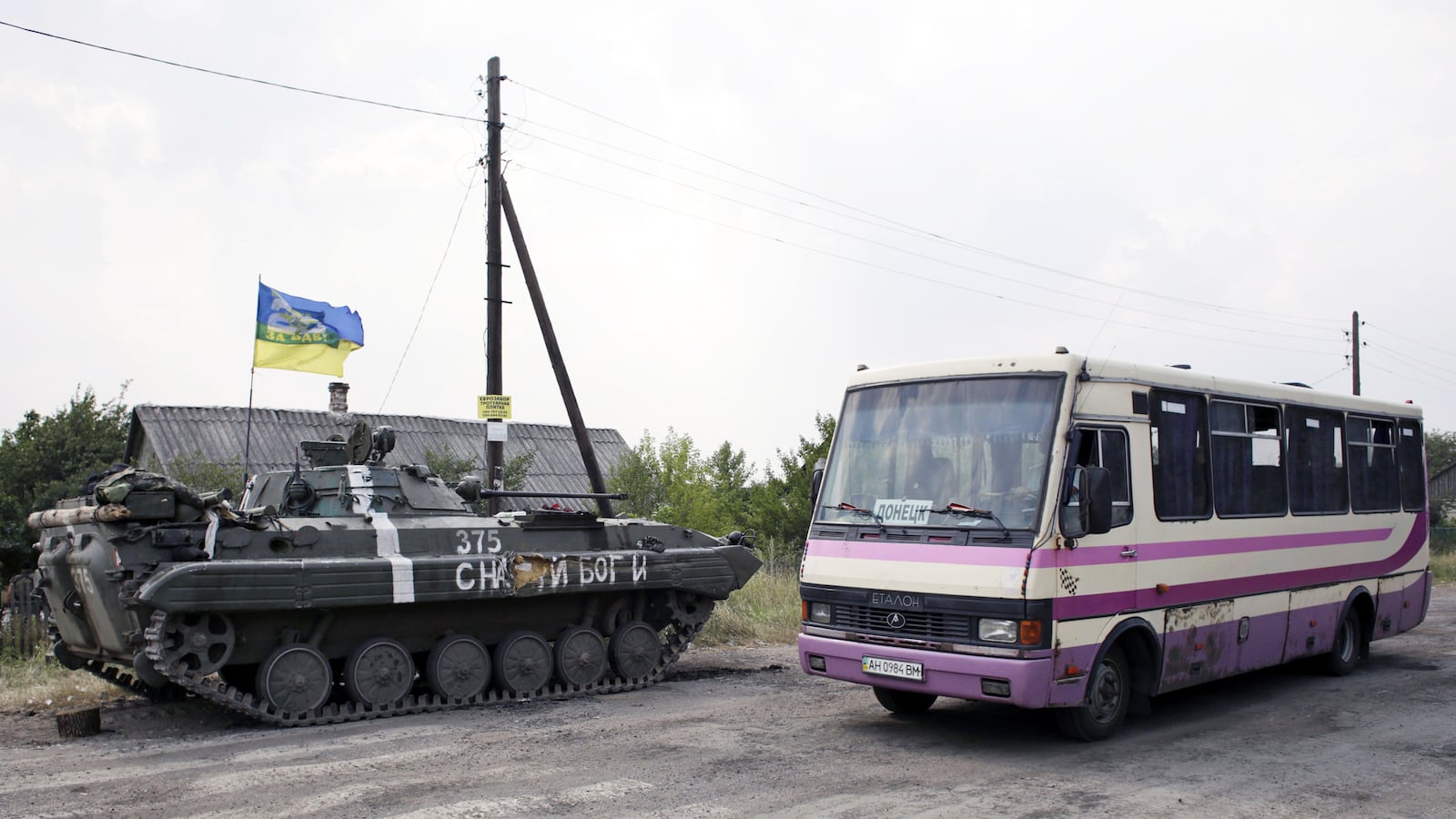 articles/2014/09/08/on-the-bus-ukraine-s-frontline-express-across-the-battle-lines/140908-ukraine-bus-phillips-tease_smjyzy