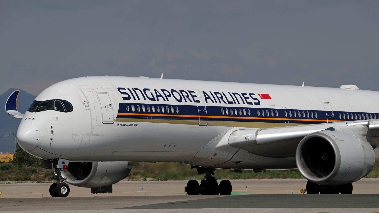 An Airbus A350-941 from Singapore Airlines is preparing to take off on the runway at Barcelona-El Prat Airport in Barcelona, Spain, on May 1, 2024.