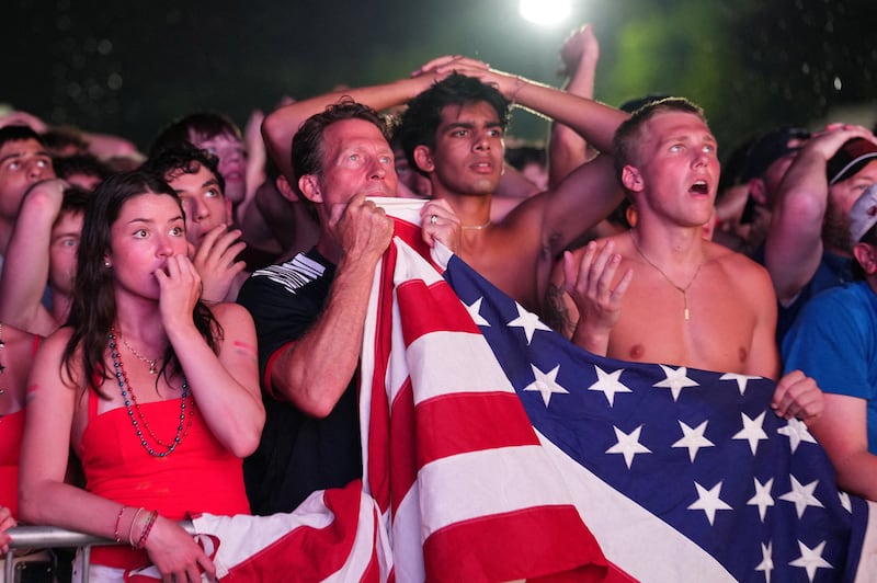 Soccer Football - FIFA World Cup 2026 - Round of 16 - United States v Belgium - Fans gather in Washington, D.C. - Washington, D.C., U.S. - July 6, 2026 U.S. fans react as they watch the match on a big screen at the National Mall REUTERS/Eric Lee     TPX IMAGES OF THE DAY