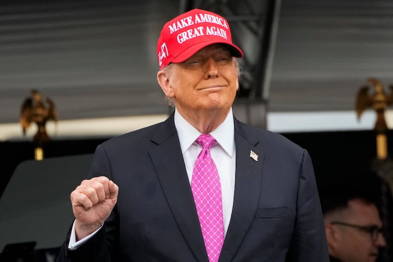 U.S. President Donald Trump wears a 'Make America Great Again' (MAGA) hat as he attends the commencement ceremony at West Point Military Academy in West Point, New York, U.S., May 24, 2025. REUTERS/Eduardo Munoz