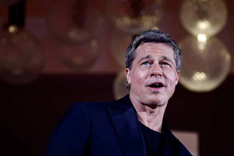 Cast member Brad Pitt poses on the red carpet during arrivals for the movie "Wolfs", presented out of competition, during the 81st Venice Film Festival in Venice, Italy, September 1, 2024. REUTERS/Yara Nardi     TPX IMAGES OF THE DAY