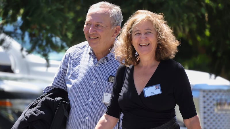 Former U.S. Treasury Secretary Larry Summers; and his wife Elisa New in 2022.