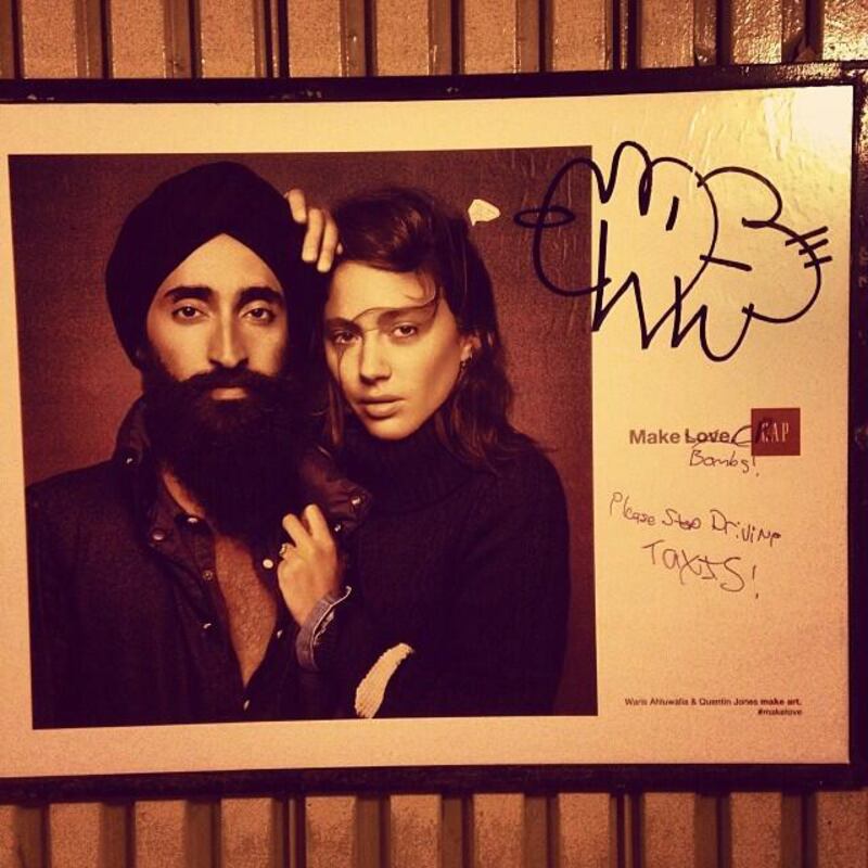 articles/2013/11/26/gap-ad-featuring-an-indian-model-goes-viral-after-racist-vandalism/131126-gap-ad-iftikhar-embed1_eo1lc6