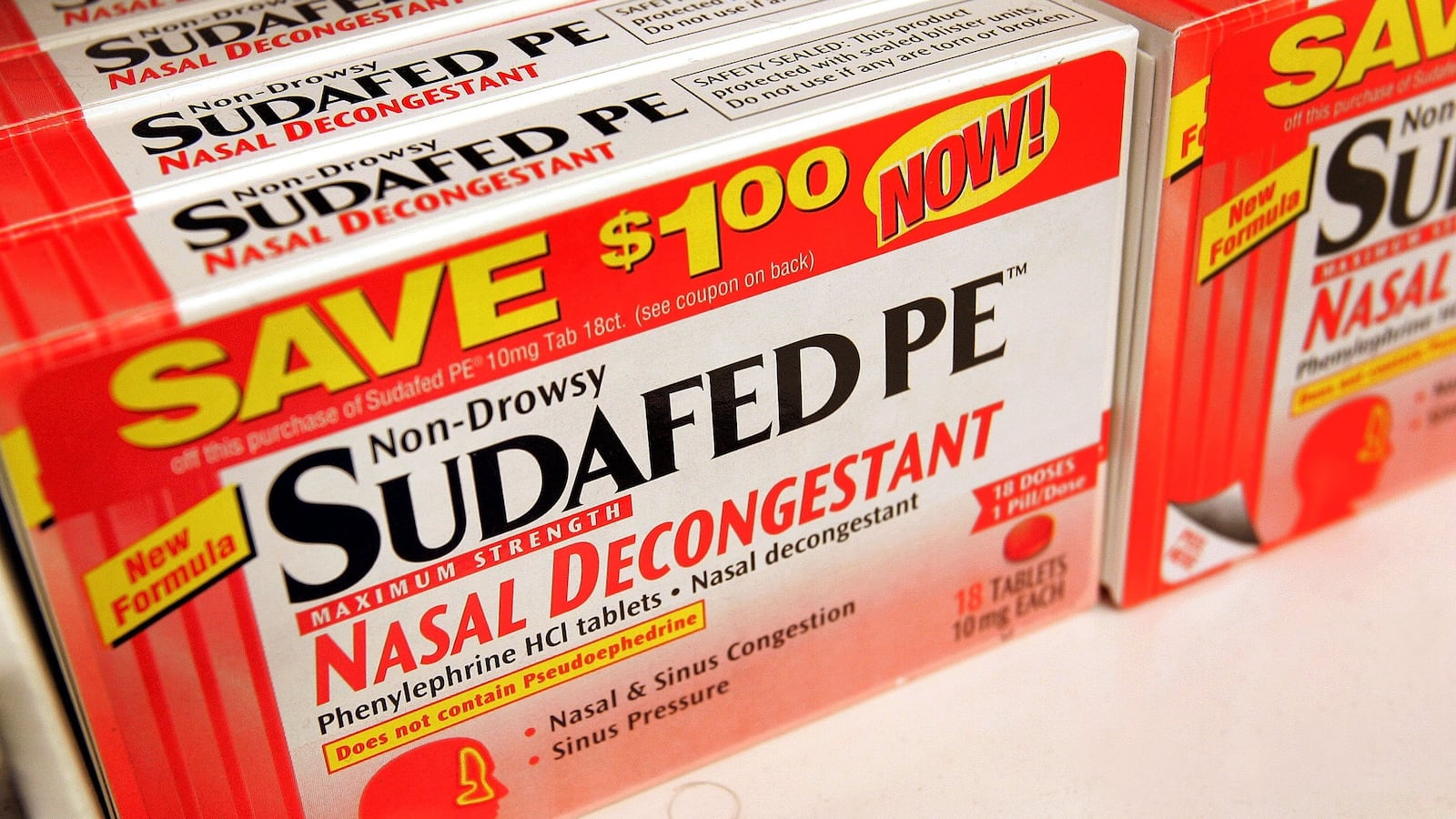 Pfizer's Sudafed PE nasal decongestant is displayed on a shelf at a Walgreens store