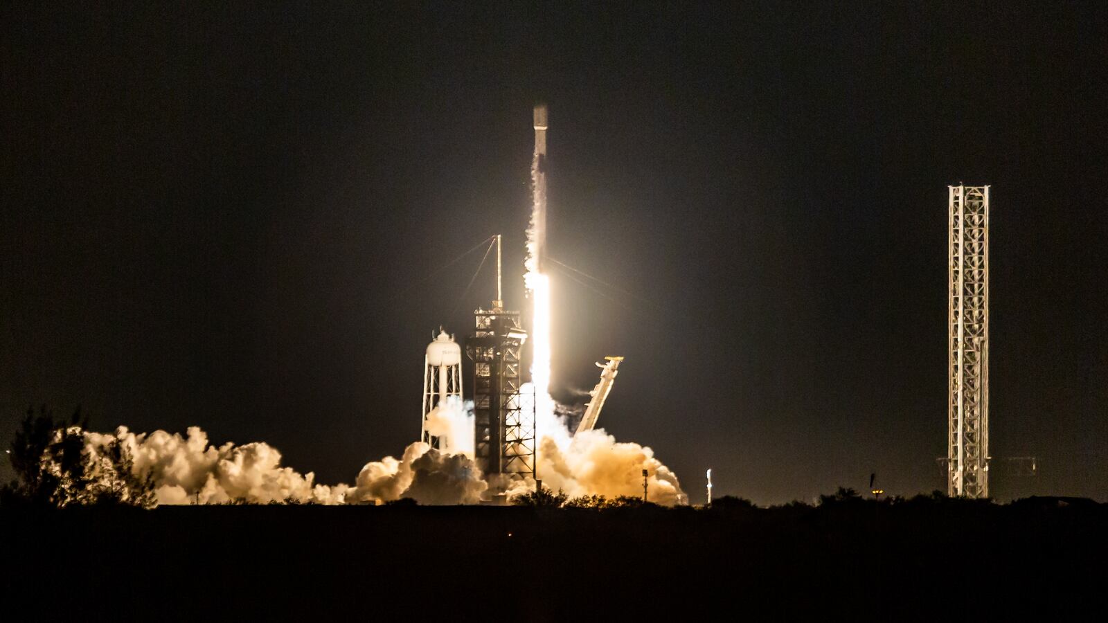 A SpaceX Falcon 9 rocket launches from launch pad 30A at the Kennedy Space Center, carrying the Intuitive Machines Moon Lander Athena.