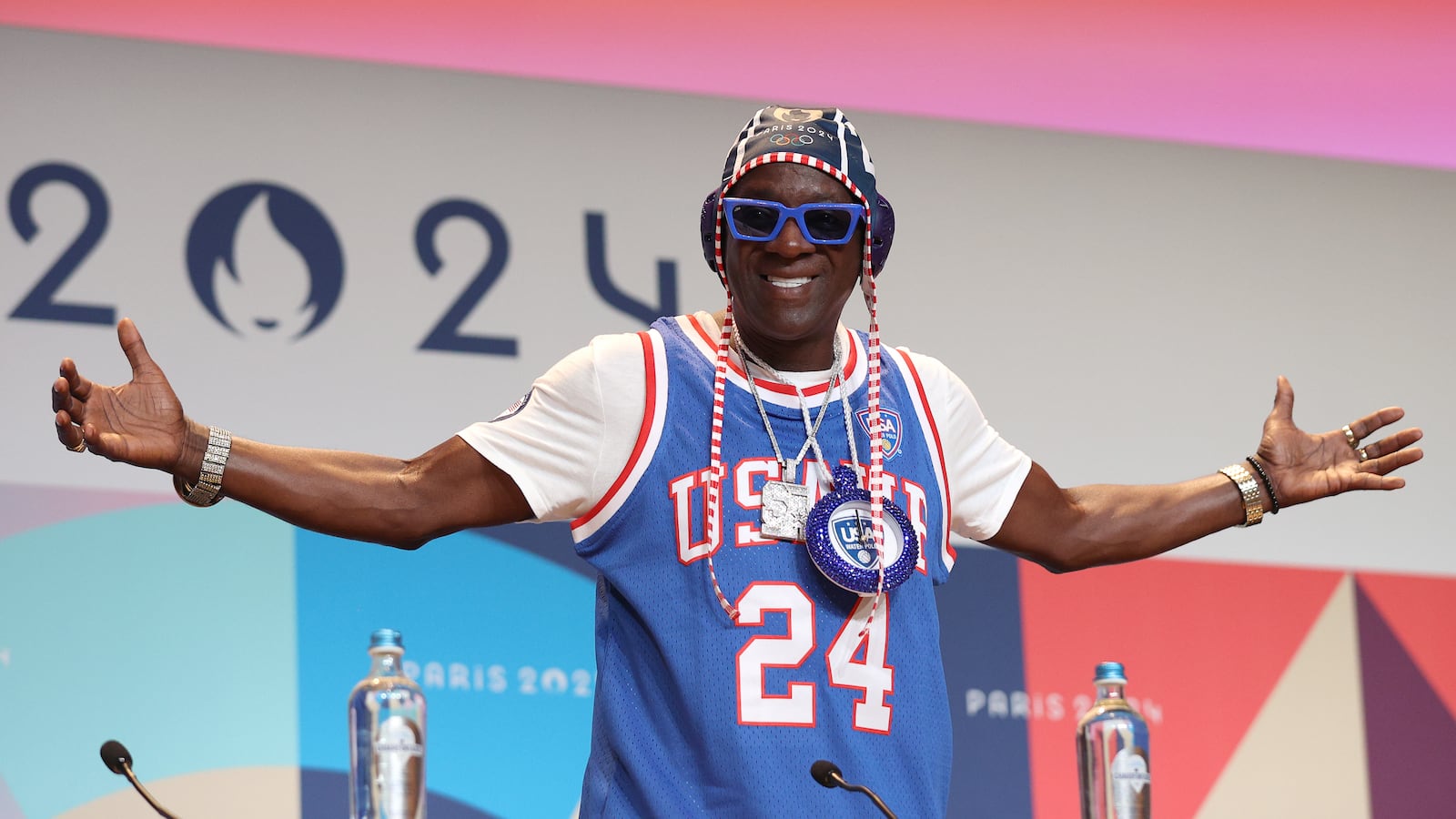 Flavor Flav at a Team USA press conference during the Paris Olympics.