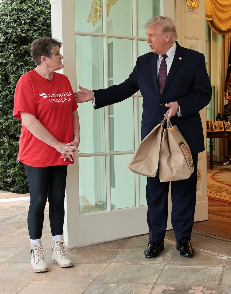 Trump received a McDonald's delivery from DoorDash driver Sharon Simmons outside the Oval Office on Monday.