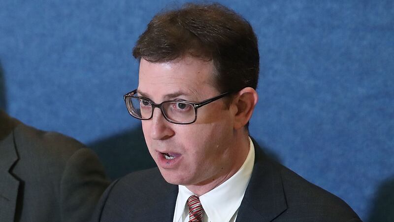 Attorney Mark Zaid (R) speaks about a lawsuit, against President Donald Trump, on March 9, 2017 in Washington, DC.