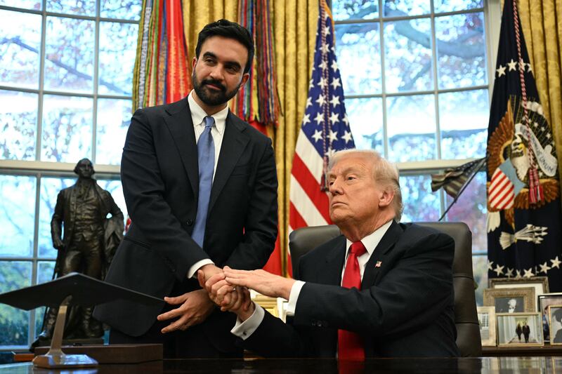 US President Donald Trump (R) shakes hands with New York Mayor-elect Zohran Mamdani as they meet in the Oval Office of the White House in Washington, DC, on November 21, 2025. (Photo by Jim WATSON / AFP via Getty Images)
