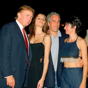 From left, American real estate developer Donald Trump and his girlfriend (and future wife), former model Melania Knauss, financier (and future convicted sex offender) Jeffrey Epstein, and British socialite Ghislaine Maxwell pose together at the Mar-a-Lago club, Palm Beach, Florida, February 12, 2000. (Photo by Davidoff Studios/Getty Images)