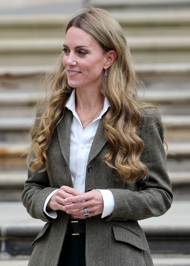 Catherine, Princess of Wales debuts a new lighter hair shade during a visit to the Natural History Museum's newly renovated gardens