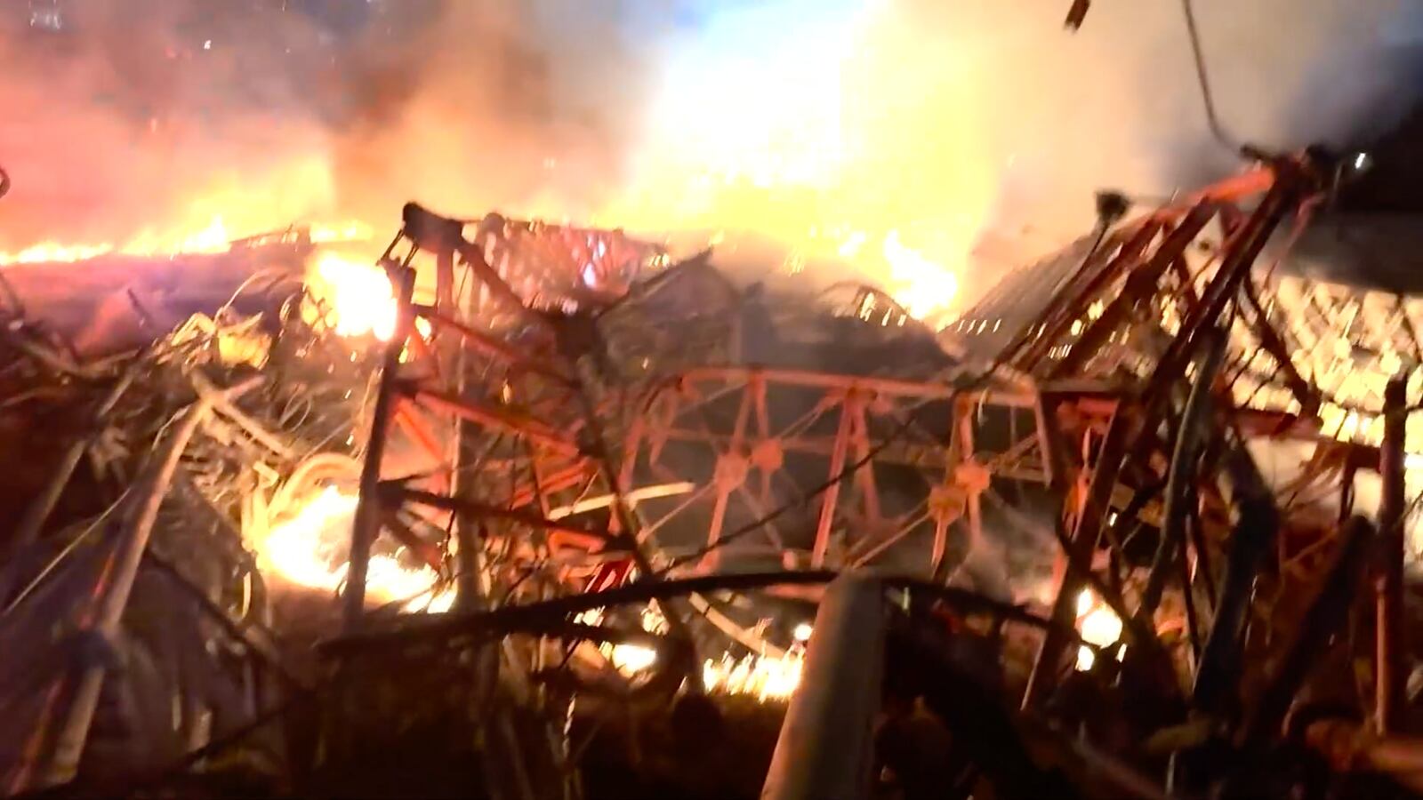 The flaming wreckage of a scene in Houston where a helicopter crashed into a radio tower.