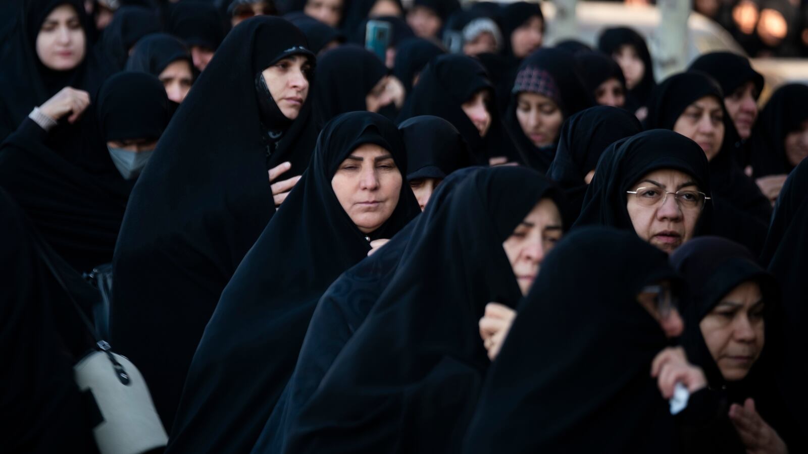 Veiled Iranian women participate in a funeral in northwestern Tehran, Iran, on November 30, 2024.