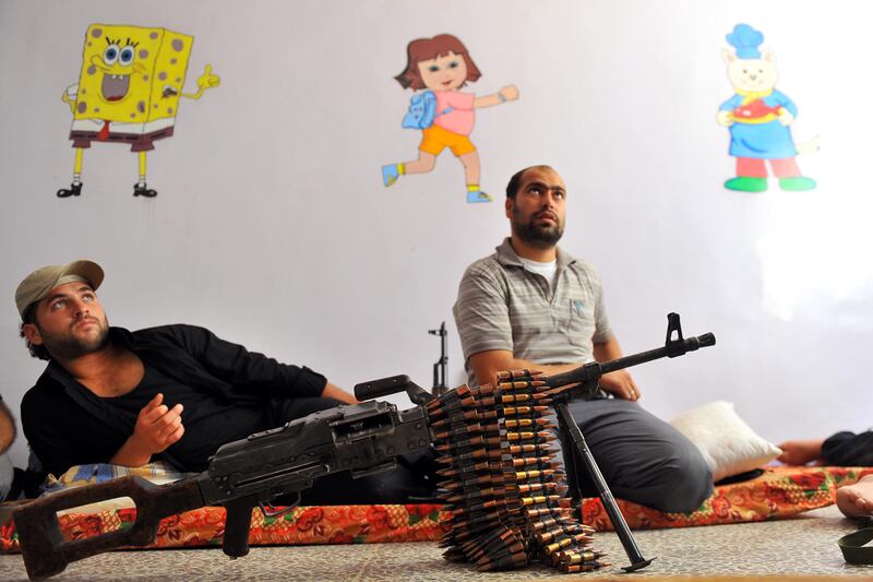 articles/2012/07/26/as-syrian-troops-pour-into-aleppo-rebels-warn-of-drawn-out-war/syrian-rebels-school-mcelroy_lgukp1