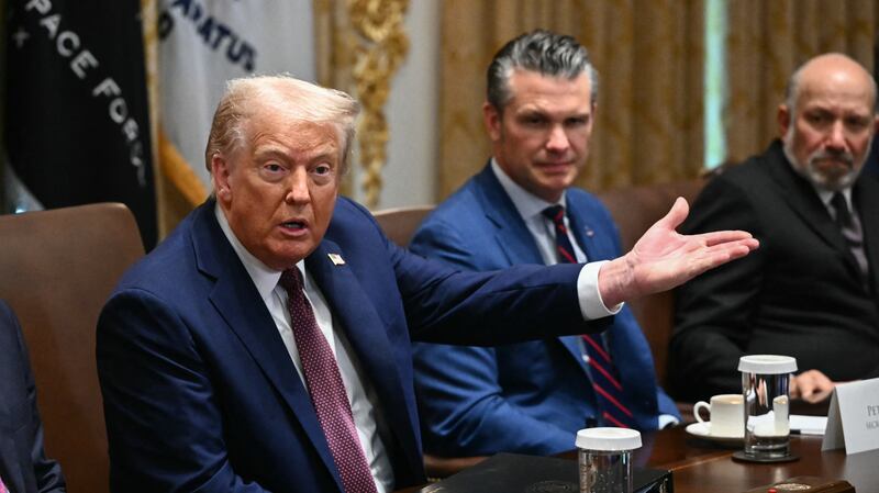 US President Donald Trump speaks during in a cabinet meeting, alongside Secretary of State Marco Rubio (L), Secretary of Defense Pete Hegseth (2R), and Secretary of Commerce Howard Lutnick (R), in the Cabinet Room of the White House in Washington, DC on August 26, 2025. (Photo by Mandel NGAN / AFP) (Photo by MANDEL NGAN/AFP via Getty Images)