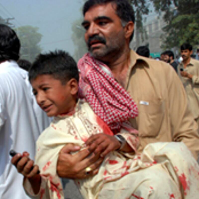 articles/2009/10/22/terrified-whispers-in-pakistan/bhutto-pakistan-bombings_58062_y89hqj