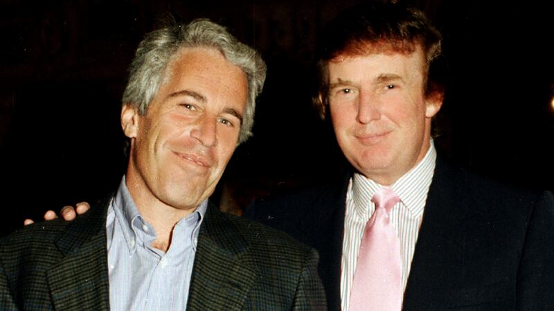 Jeffrey Epstein (left) and Donald Trump as they pose together at the Mar-a-Lago estate, Palm Beach, Florida on February 22, 1997.