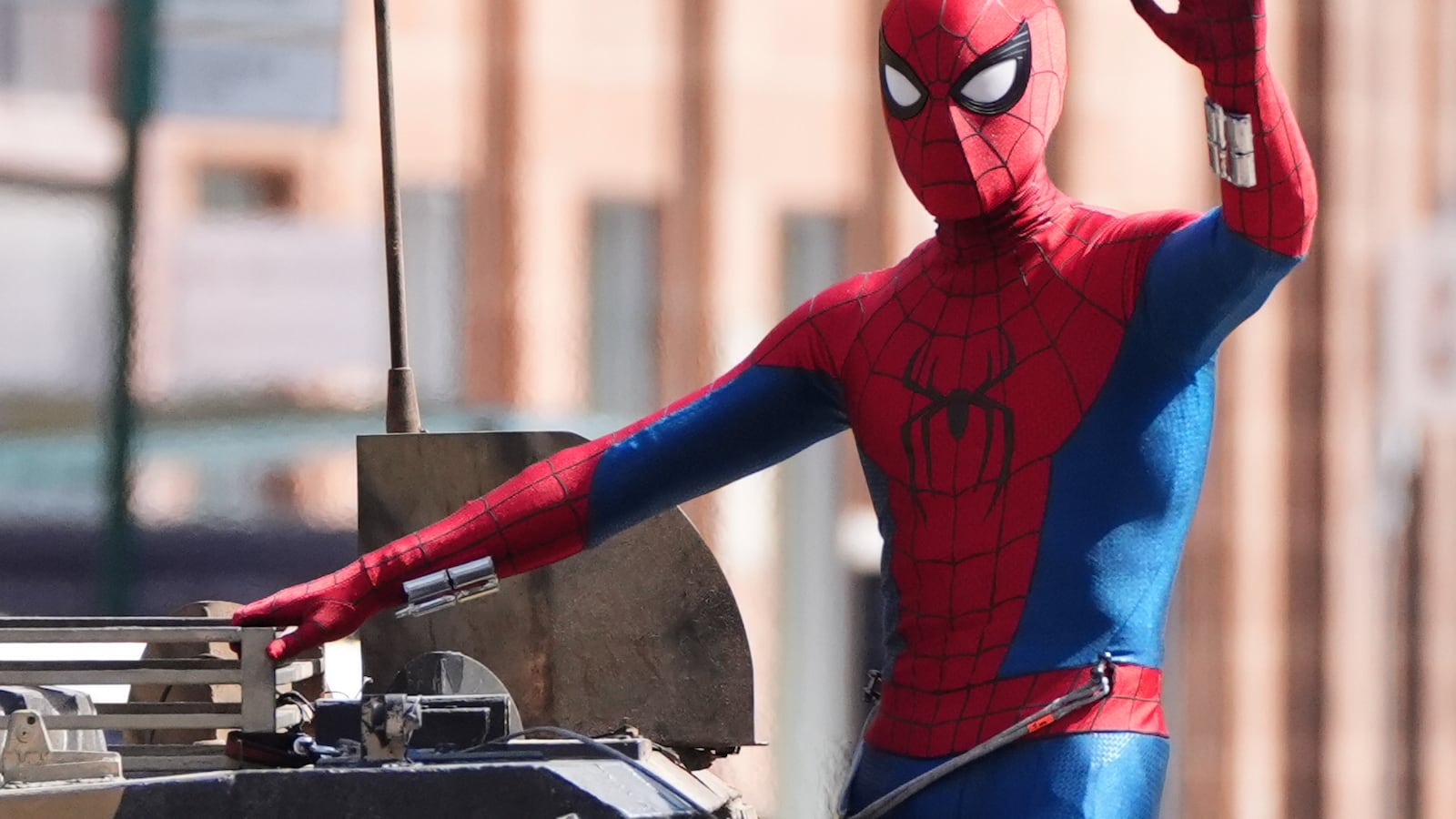 A person in a Spider-Man suit during filming on Hutcheson Street in Glasgow for the latest film in the Spider-Man franchise, Spider-Man: Brand New Day. The sequel will see Tom Holland reprise his main role and is set to be directed by Destin Daniel Cretton. Picture date: Wednesday August 13, 2025. (Photo by Andrew Milligan/PA Images via Getty Images)
