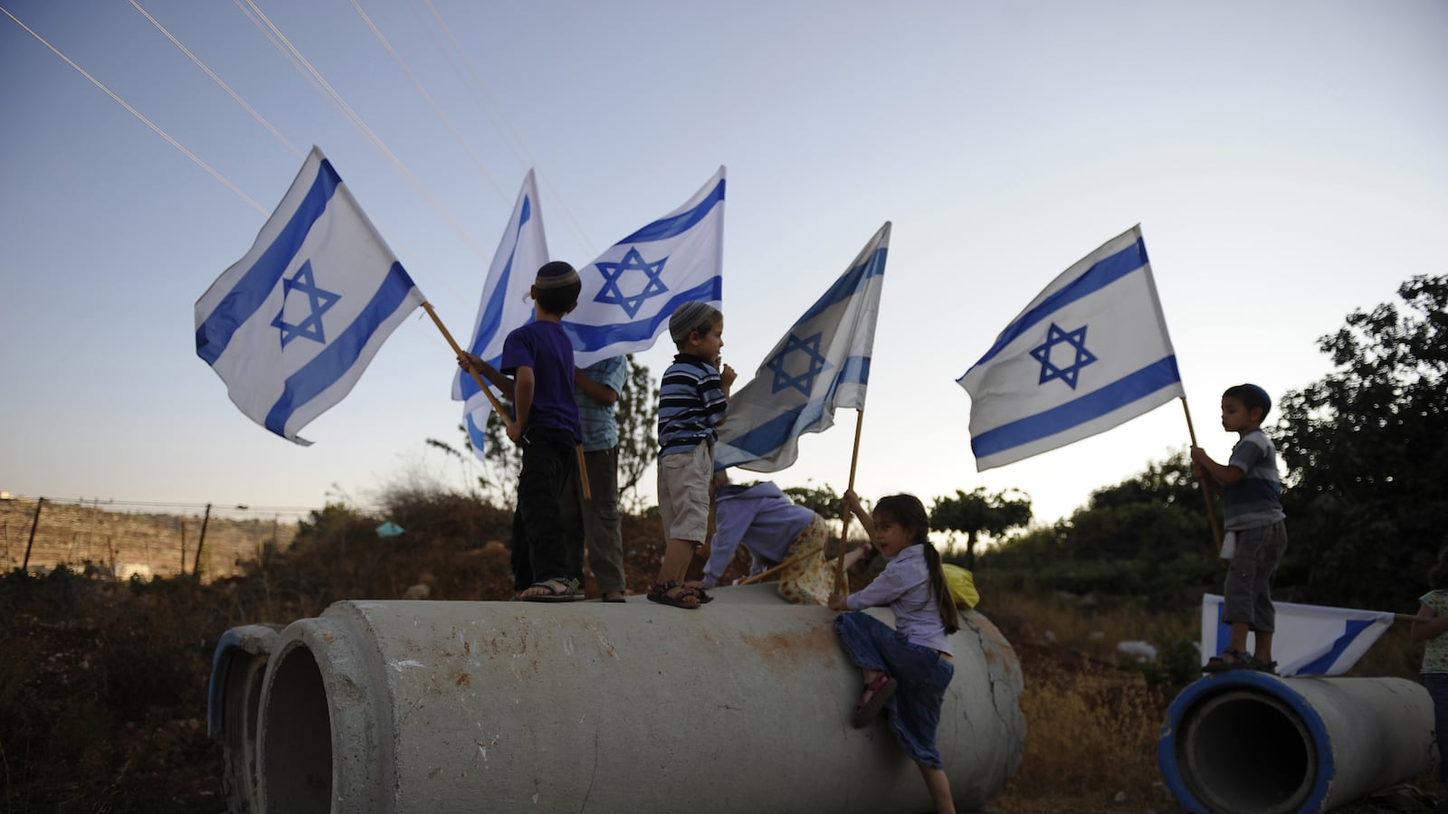 articles/2012/06/15/the-religious-zionist-you-didn-t-know/settler-kids-openz_iitve3